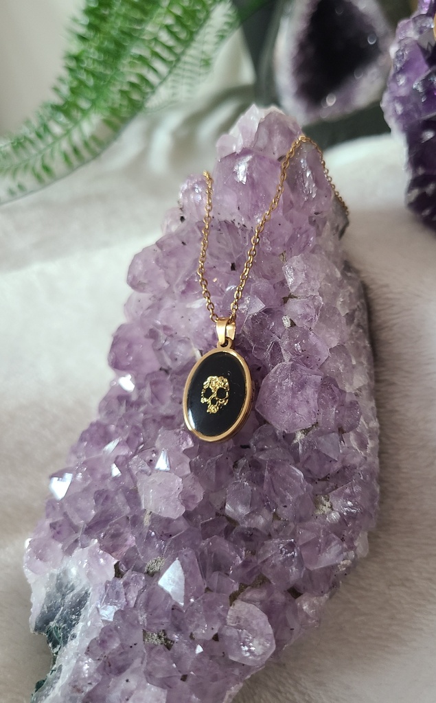 Collier crâne doré 